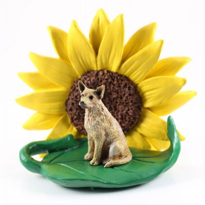 Australian Cattle Dog Red Figurine Sitting on a Green Leaf in Front of a Yellow Sunflower