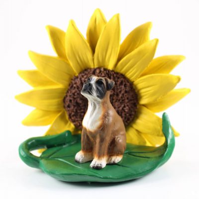 Boxer Uncropped Figurine Sitting on a Green Leaf in Front of a Yellow Sunflower