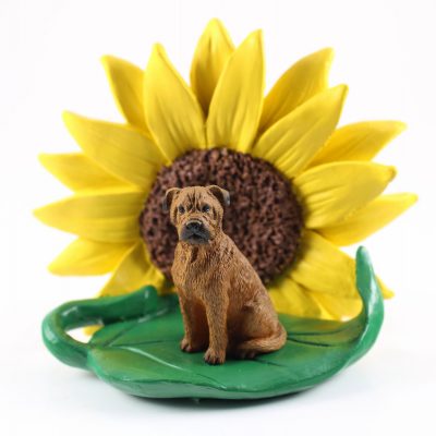 Bull Mastiff Figurine Sitting on a Green Leaf in Front of a Yellow Sunflower