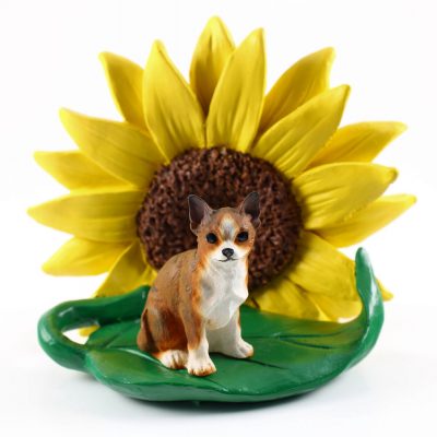 Chihuahua Brindle Figurine Sitting on a Green Leaf in Front of a Yellow Sunflower