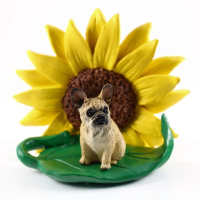 French Bulldog Cream Figurine Sitting on a Green Leaf in Front of a Yellow Sunflower