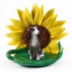 Greyhound Gray/White Figurine Sitting on a Green Leaf in Front of a Yellow Sunflower
