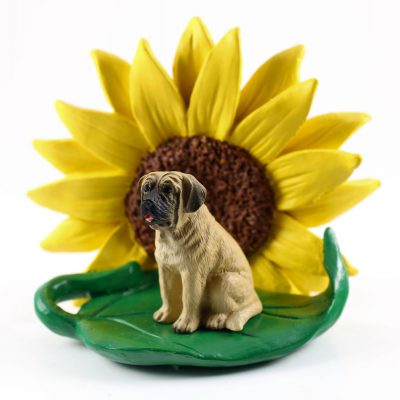 Mastiff Figurine Sitting on a Green Leaf in Front of a Yellow Sunflower