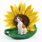 Pointer Brown Figurine Sitting on a Green Leaf in Front of a Yellow Sunflower