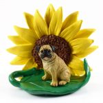Pug Fawn Figurine Sitting on a Green Leaf in Front of a Yellow Sunflower
