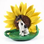 Rat Terrier Figurine Sitting on a Green Leaf in Front of a Yellow Sunflower