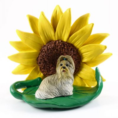 Shih Tzu Mixed Colored Figurine Sitting on a Green Leaf in Front of a Yellow Sunflower