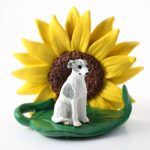 Whippet Gray Figurine Sitting on a Green Leaf in front of a Yellow Sunflower